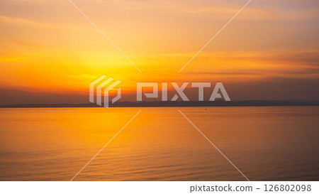 Sunset at Cape Kakuda: Sunset over Sado Island 126802098