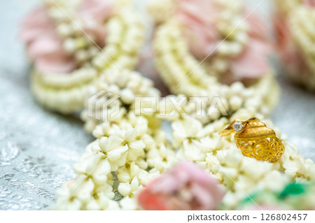 Gold ring , Wedding ring,Diamond ring on the flowers. 126802457