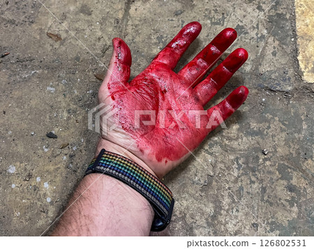 Crime scene with human hand in blood on the floor. High quality photo 126802531