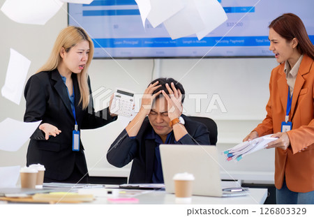 Stressful Business Meeting. Professionals facing challenges in financial discussion. 126803329