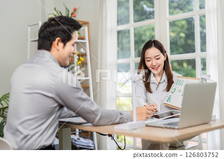 ESG Business Meeting. Engaging discussion on sustainability initiatives. 126803752