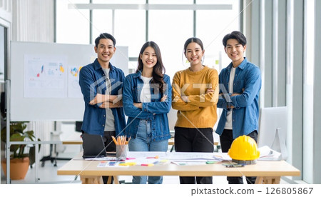 Japanese men and women working in a designer office 126805867