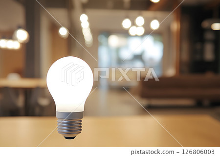 LED light bulb on the bright room background. 126806003