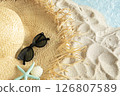 Starfish and shells washed up on a summer beach 126807589