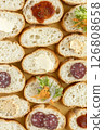 Assorted French bread sandwiches 126808658