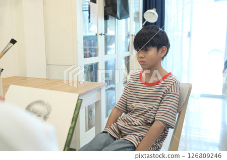 Drawing a Portrait 126809246