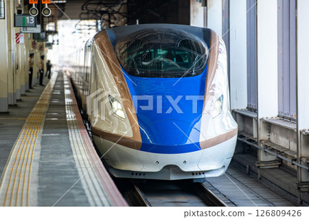 Hokuriku-Etsu Shinkansen E7 series at Omiya Station 126809426