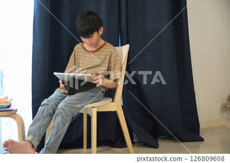 Using Digital Tablet 126809608