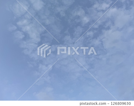 Thin clouds are spreading across the blue sky. Thin clouds are spreading across the blue sky. 126809630