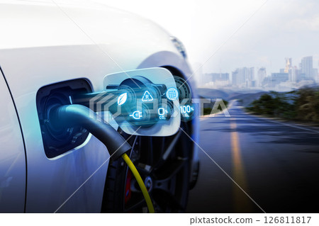 Power cable pump plug in charging power to electric vehicle EV car. 126811817