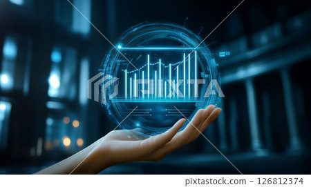 Hand holding digital globe with financial symbols and graphs, showcasing data analysis and technology 126812374