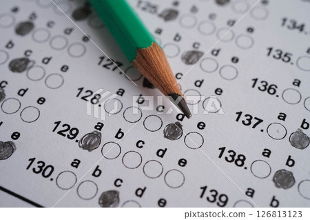 Answer sheets with pencil drawing fill to select choice, education concept. 126813123