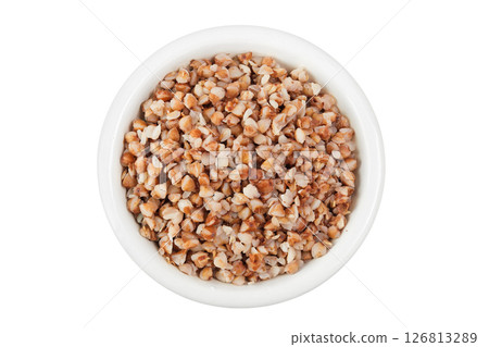 Boiled buckwheat in a ceramic bowl isolated on white background. Top view. Flat lay 126813289