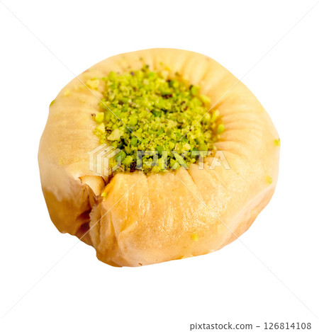 piece of round baklava with pistachio cut out piece of round baklava with pistachio cut out 126814108