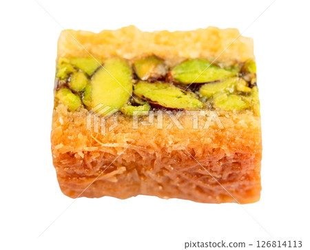piece of square baklava with pistachio cut out 126814113