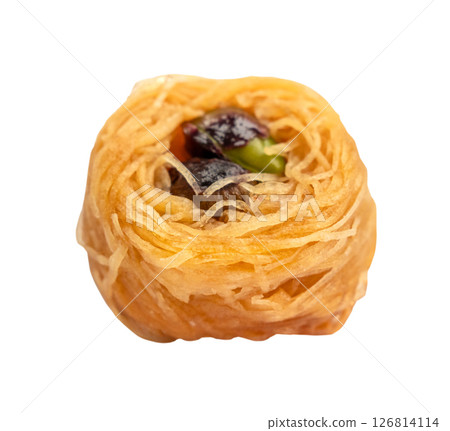 piece of baklava with pistachio nuts cut out piece of baklava with pistachio nuts cut out 126814114