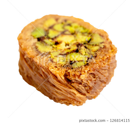 piece of mabrume baklava with pistachio cut out piece of mabrume baklava with pistachio cut out 126814115