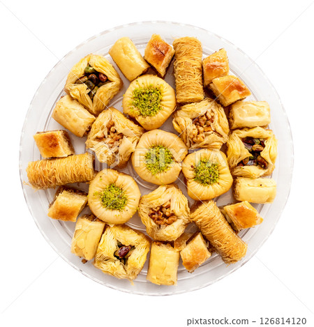 top view of various baklava on round plate cut out top view of various baklava on round plate cut out 126814120
