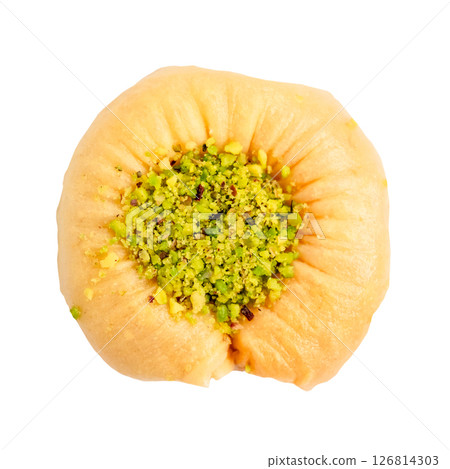 top view of piece of round baklava with pistachio 126814303