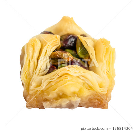 piece of layered square baklava with pistachio piece of layered square baklava with pistachio 126814304