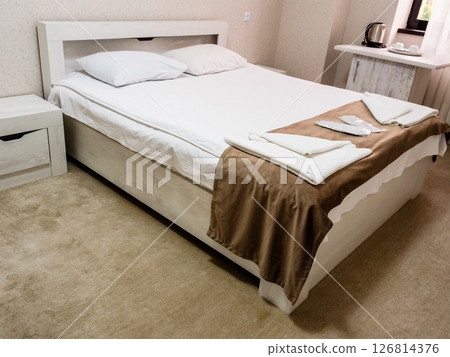 interior of standart hotel room with double bed 126814376