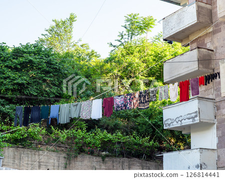 washed clothes dry on clothesline in Kapan town washed clothes dry on clothesline in Kapan town 126814441