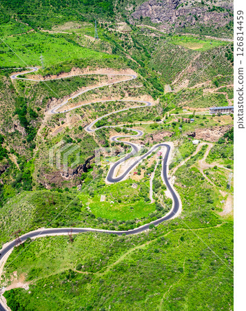 aerial view of Devil's Bridge on serpentine road 126814459