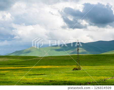 gray rainy clouds over green fields in Syunik gray rainy clouds over green fields in Syunik 126814509