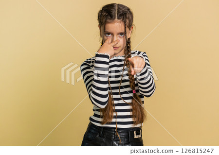 School child girl show pointing at her eyes and camera I am watching you gesture, spying on someone 126815247
