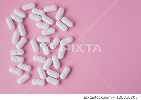 Much medical pills and drugs in white package on the pink background. Healthcare concept. Space for text. Much medical pills and drugs in white package on the pink background. Healthcare concept. Space for text. 126816703