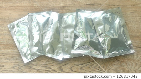 snack package aluminum foil mock-up arranging on table  126817342