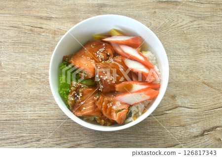 grilled saba fish or mackerel topping crab stick and lettuce on japanese rice in bowl grilled saba fish or mackerel topping crab stick and lettuce on japanese rice in bowl 126817343