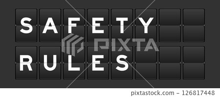 Black color analog flip board with word safety rules on gray background 126817448