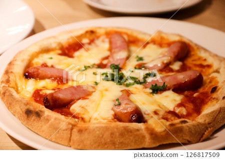 Raclette cheese and sausage 126817509
