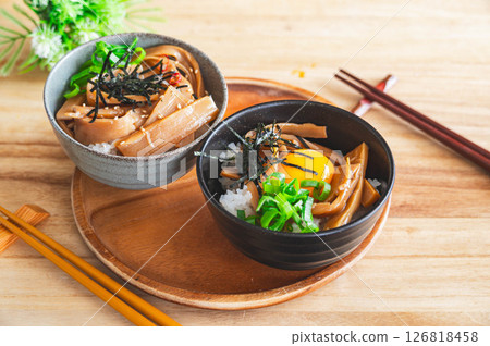 Menma rice bowl topped with egg yolk 126818458