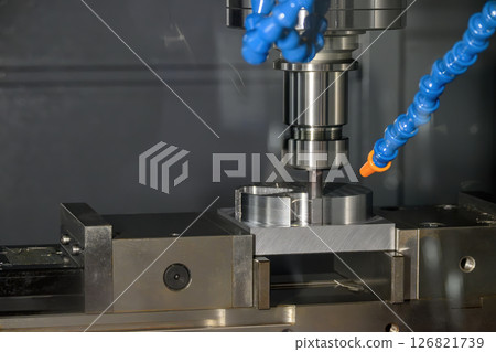 The CNC milling machine finish cut the metal parts by solid flat nose end mill tool. The CNC milling machine finish cut the metal parts by solid flat nose end mill tool. 126821739