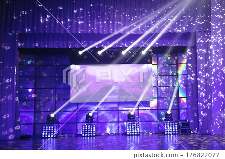 Scene in violet light with spotlights. Scene in violet light with spotlights. 126822077