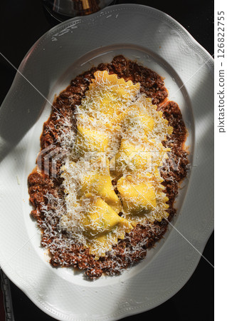 Portion of ravioli dumplings with minced beef Portion of ravioli dumplings with minced beef 126822755