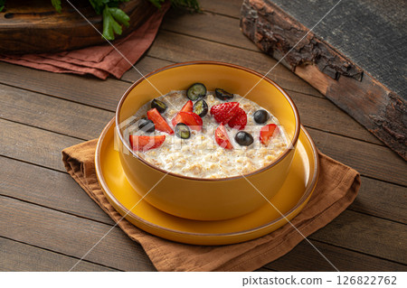 Sweet breakfast oatmeal porridge with berries Sweet breakfast oatmeal porridge with berries 126822762