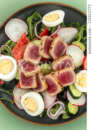 Portion of nicoise salad with tuna fish and eggs 126822771