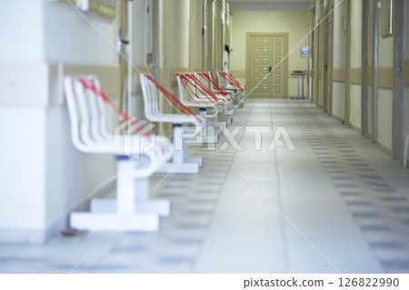 Social distancing concept, warning signs on seats due to coronavirus. 126822990