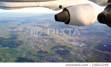 Zurich, Switzerland, April 15, 2015: View from BAe 146 after Takeoff Zurich, Switzerland, April 15, 2015: View from BAe 146 after Takeoff 126823209