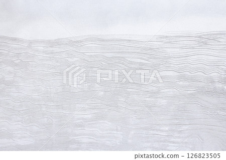 Concrete plastering wall and scrate surface to prepare for tile installation. 126823505