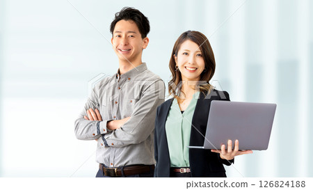 Image of business teamwork between two men and women 126824188