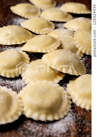 Fresh Homemade Ravioli Pasta on Board 126824434