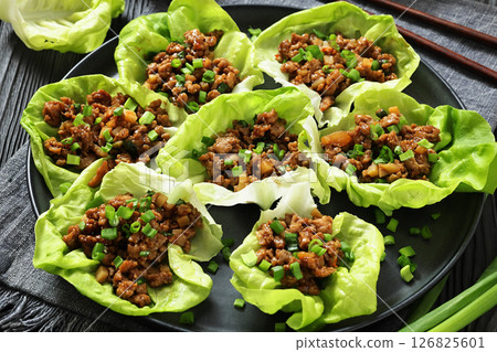 Fresh and Crispy Ground Chicken lettuce wraps 126825601