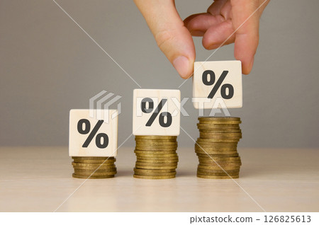 Businessman makes growing financial chart Businessman makes growing financial chart 126825613