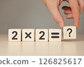 Simple math example 2x2 with a question mark. 126825617