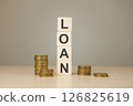 Stack of wooden cubes word loan 126825619