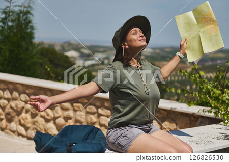 Traveler With Map Exploring Scenic Mediterranean Village in Springtime 126826530